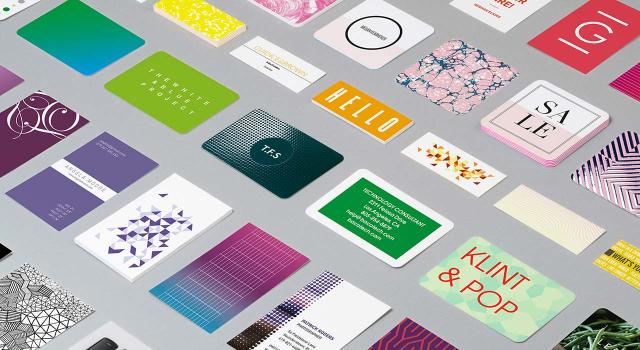 Mosaic of Business Cards in various designs on gray background